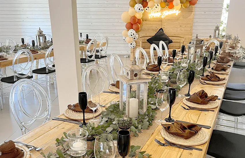 A themed party table with balloons in the Mabweni venue at Usambara Venue