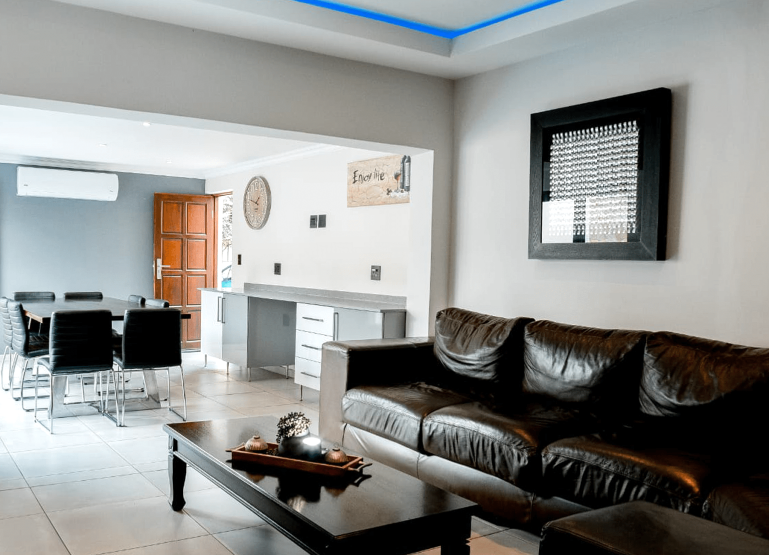 The open-plan lounge and dining area of the executive suite at Usambara Lodge