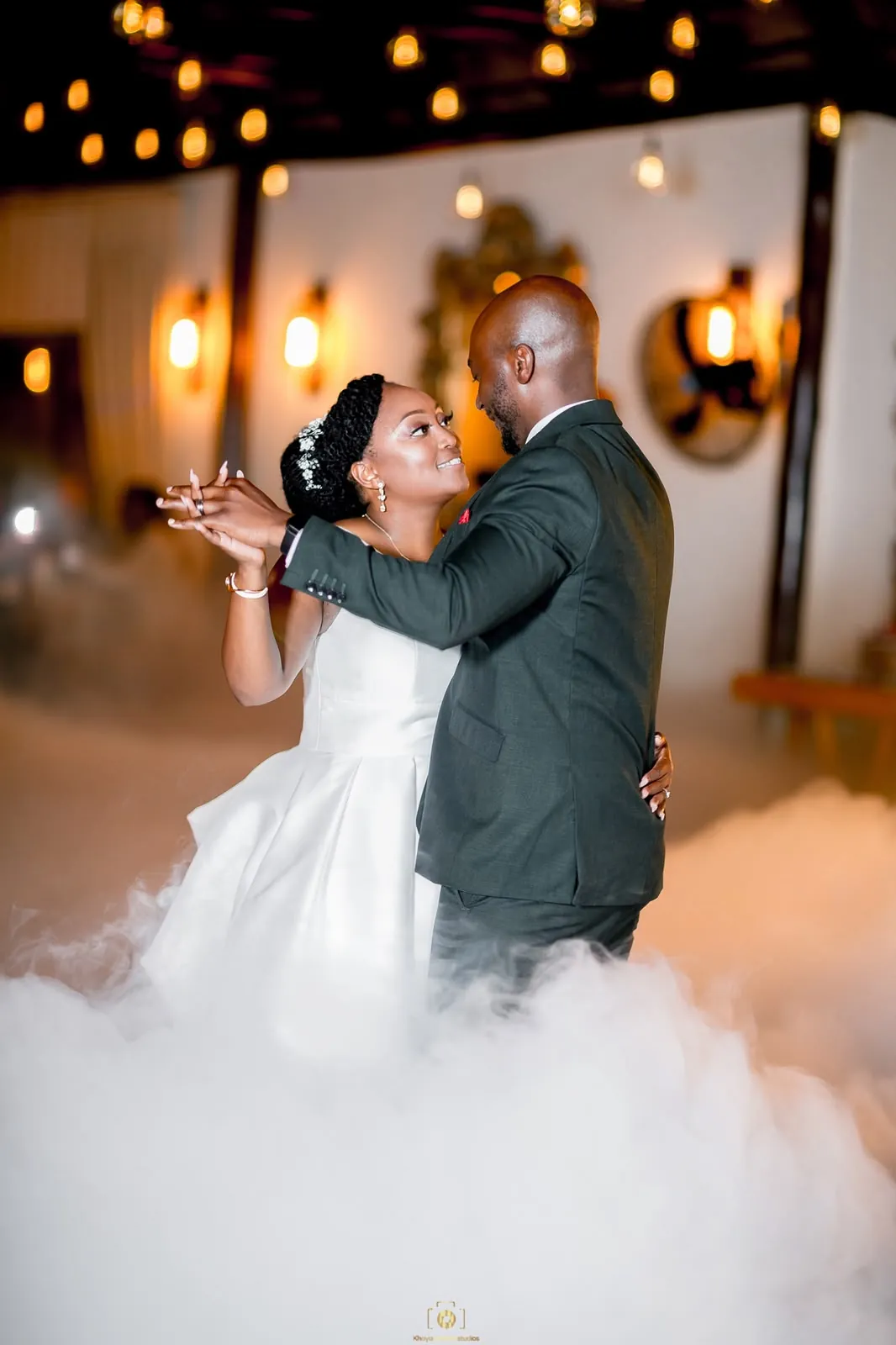 Bride and groom's first dance in the reception venue at Usambara Venue
